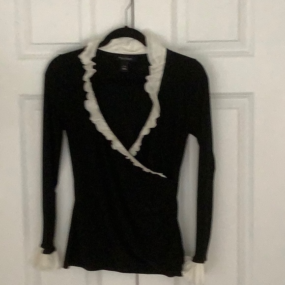 White House black market black top with white ruffled neck and sleeves. - Picture 2 of 6